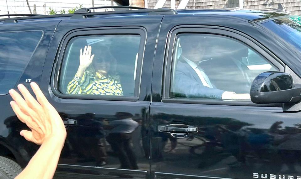 Jill Biden, the first lady of the United States, waves to a crowd Friday in Provincetown as she passes on Commercial Street heading to a fundraiser to reelect her husband, President Joe Biden. The fundraiser was co-sponsored by Provincetown homeowners Bryan Rafanelli and Alix Ritchie.