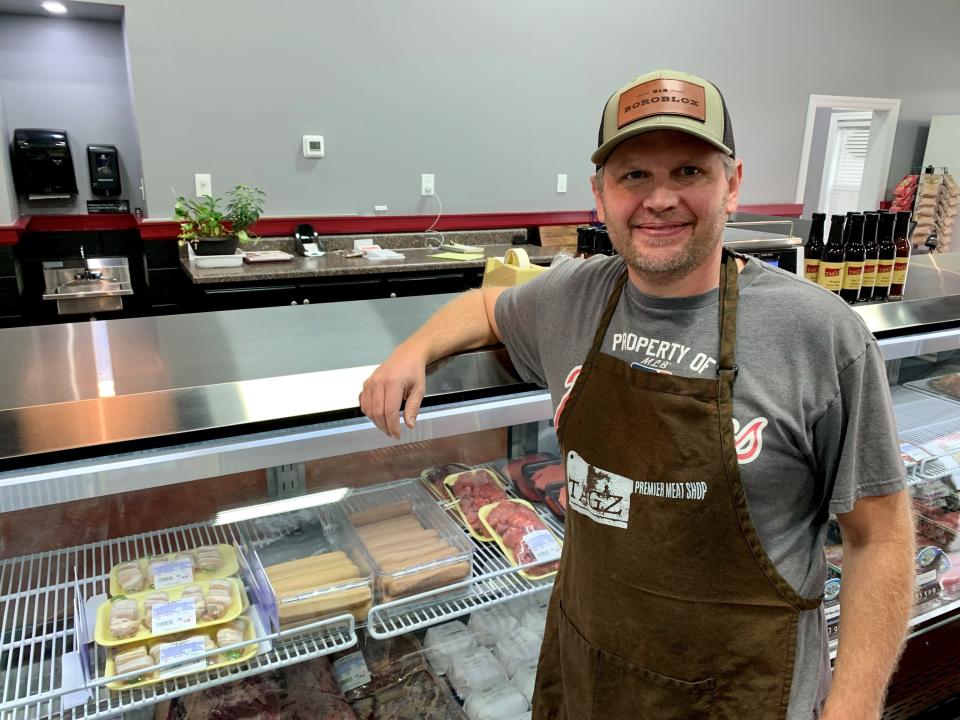Tag'z 5 Star Meats owner Mike Malone stands in the new location for the shop at 1862 Memorial Blvd. in Murfreesboro.