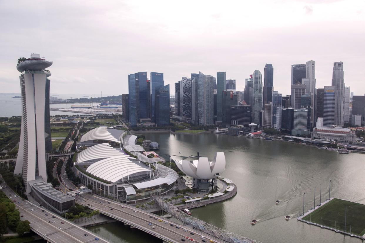 The Marina Bay Sands and the business district in Singapore, on Saturday, Oct. 8, 2022. Singapore is scheduled to announce its third quarter advanced gross domestic product (GDP) estimate on Oct 10, 2022. Photographer: Ore Huiying/Bloomberg