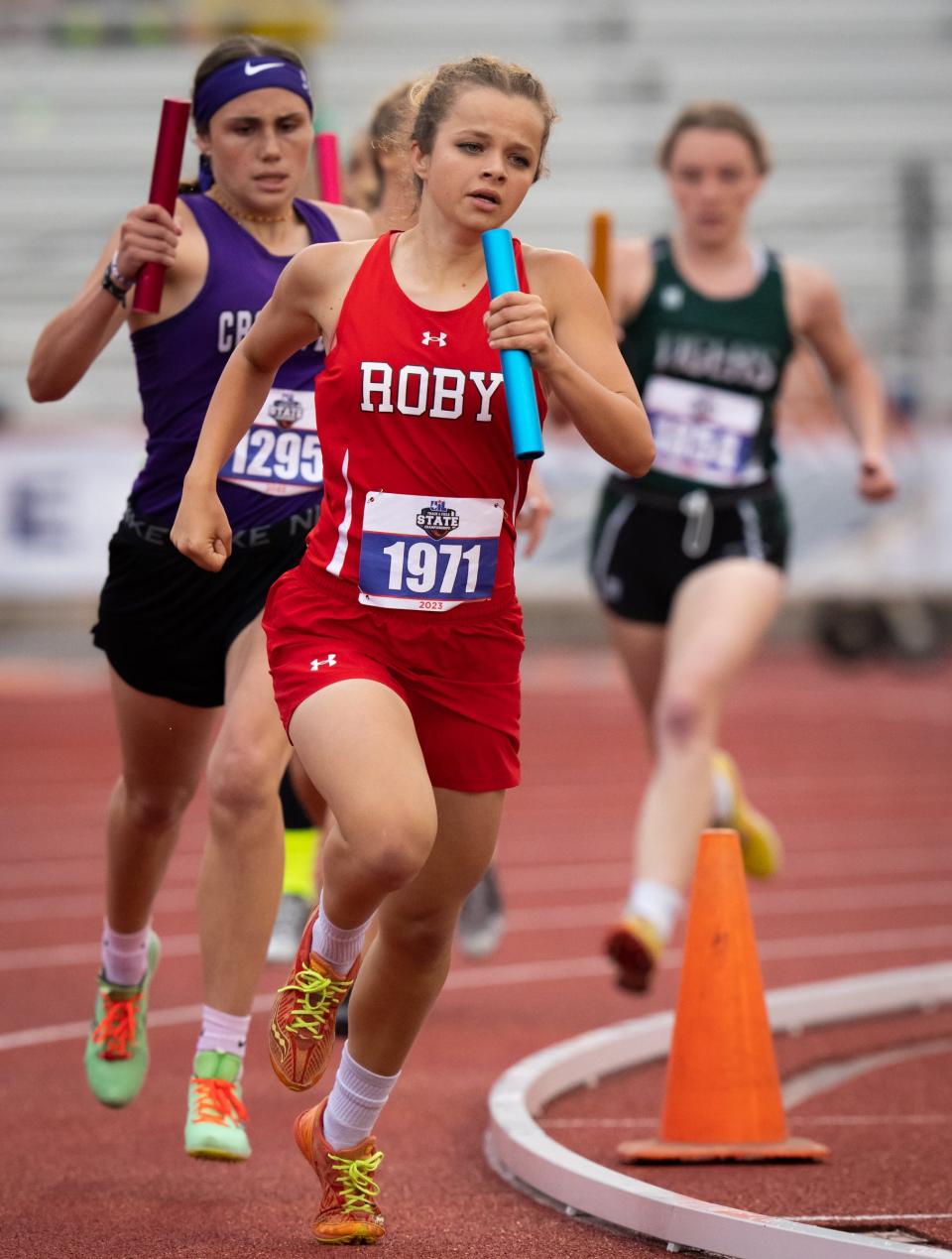 A Roby athlete competes in the girls' 1,600-meter relay at the state meet Saturday at Mike A. Myers Stadium in Austin. The Roby team finished second with a time of 4:12.15.
