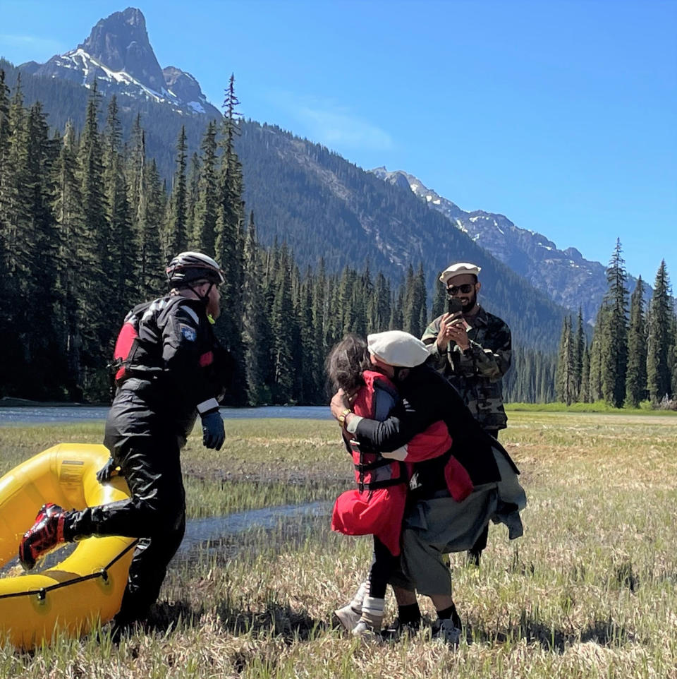 10-year-old Shunghla Mashwani is greeted by members of her family after being rescued on Monday. (Kittitas County Sheriff)