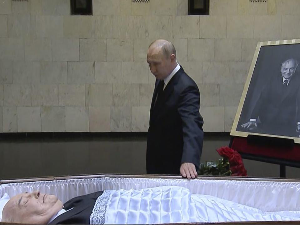  In this image taken from video, Russian President Vladimir Putin pays his last respect near the coffin of former Soviet President Mikhail Gorbachev at the Central Clinical Hospital in Moscow Russia.