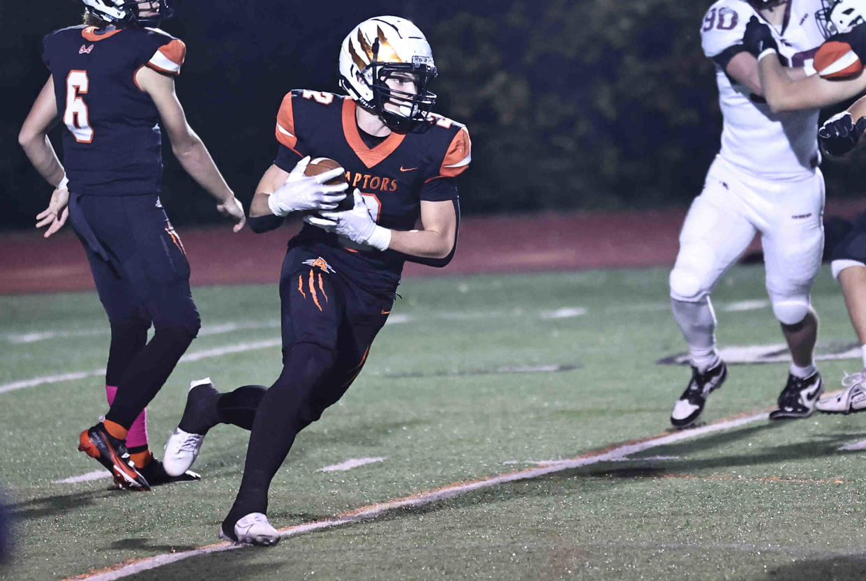 Anderson running back Brodey Berg (2) runs the ball during the Raptors' win over Turpin Friday, Oct. 27, 2023.