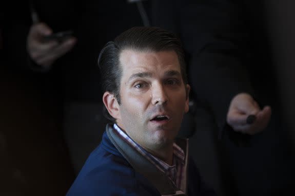 Donald Trump Jr. answers questions from reporters while touring Sarris Candies with Rick Saccone.