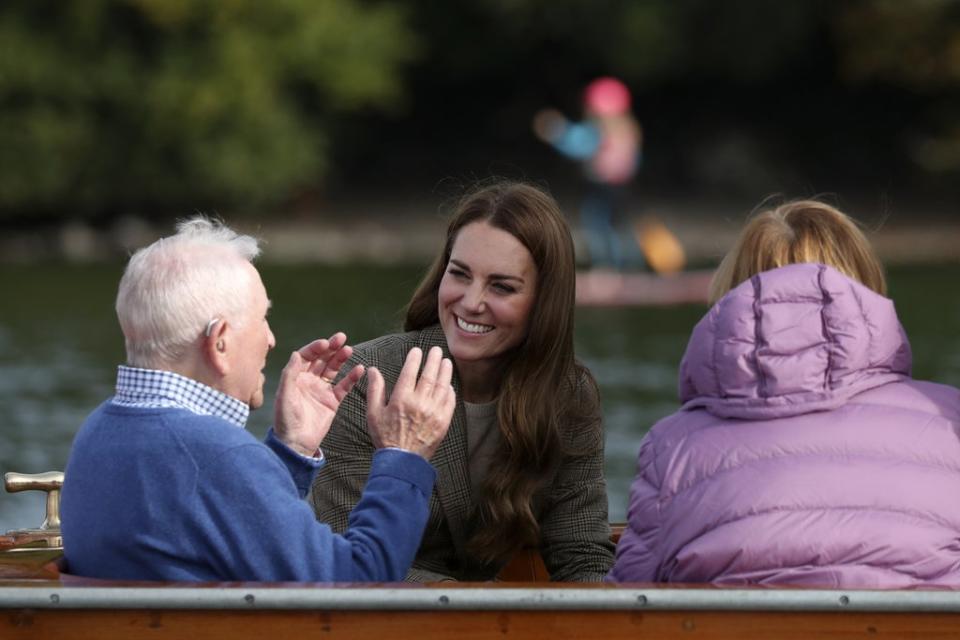 The Duchess of Cambridge (centre) meets Ike Alter and Diane Stoller in the steam launch Osprey (Scott Heppell/PA) (PA Wire)