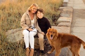 Heather Cyr, of Scituate; her son Chase, now 12; and her therapy dog Tripp, a golden retriever.