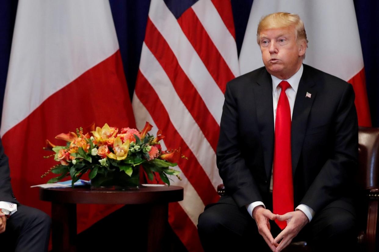 US President Donald Trump, pictured at a meeting with France's Emmanuel Macron yesterday: Reuters