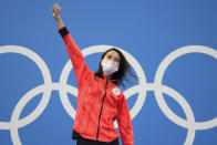 Yui Ohashi of Japan celebrates on the podium after winning the women's 200-meter individual medley final at the 2020 Summer Olympics, Wednesday, July 28, 2021, in Tokyo, Japan. (AP Photo/Matthias Schrader)