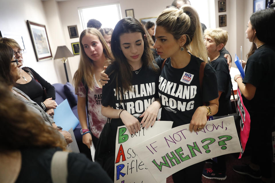 Lital Donner, youth director for Congregation Kol Tikvah, right, comforts Aria Siccone, 14, a ninth-grade student survivor from Marjory Stoneman Douglas High School, in Tallahassee, Fla., on Feb. 21, 2018. (Photo: Gerald Herbert/AP)