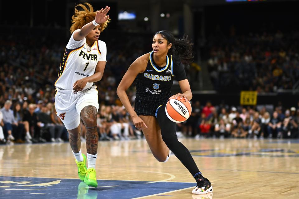 CHICAGO, ILLINOIS - JUNE 23: Angel Reese #5 of the Chicago Sky drives with the basketball in the first half against NaLyssa Smith #1 of the Indiana Fever at Wintrust Arena on June 23, 2024 in Chicago, Illinois. NOTE TO USER: User expressly acknowledges and agrees that, by downloading and or using this photograph, User is consenting to the terms and conditions of the Getty Images License Agreement. (Photo by Quinn Harris/Getty Images)