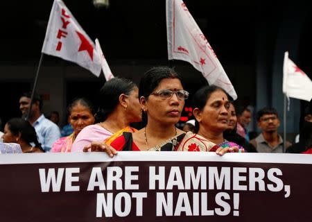 People attend a protest against what they say are attacks on India's low-caste Dalit community in Mumbai, India, July 27, 2016. REUTERS/Danish Siddiqui