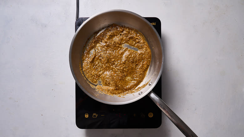 simmering sauce in skillet