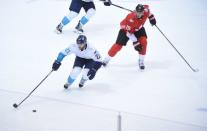 Sep 27, 2016; Toronto, Ontario, Canada; Team Europe center Tomas Tatar (21) skates with the puck against Team Canada center Ryan Getzlaf (15) during the third period in game one of the World Cup of Hockey final at Air Canada Centre. Mandatory Credit: Dan Hamilton-USA TODAY Sports