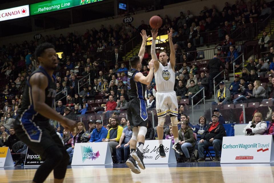 Carl English goes up for a shot against against the K.W. Titans. 