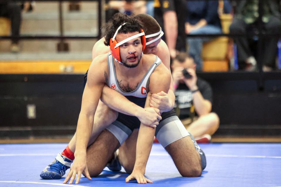 Boys Ranch’s Rowdy Barnes wrestles with Caprock’s Delco Gonzalez in a 175-pound match in the District 3-5A Wrestling Championship, February 4, 2023, at Amarillo High School, in Amarillo, Texas.  Barnes won by fall.