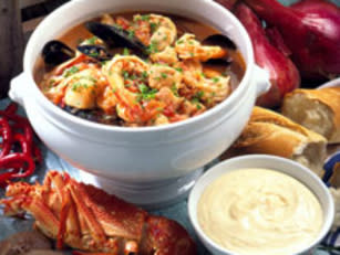 Bouillabaisse is a classic French recipe for a seafood soup is a traditional fish stew originating from the port city of Marseille in France. It is typically topped with chopped parsley and accompanied with a spicy sauce and crusty banquette. View recipe