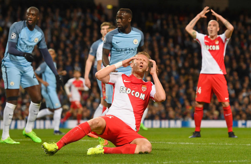 <p>Kamil Glik of AS Monaco reacts after a missed chance during the UEFA Champions League Round of 16 first leg match between Manchester City FC and AS Monaco at Etihad Stadium on February 21, 2017 in Manchester, United Kingdom. (Stu Forster/Getty Images) </p>