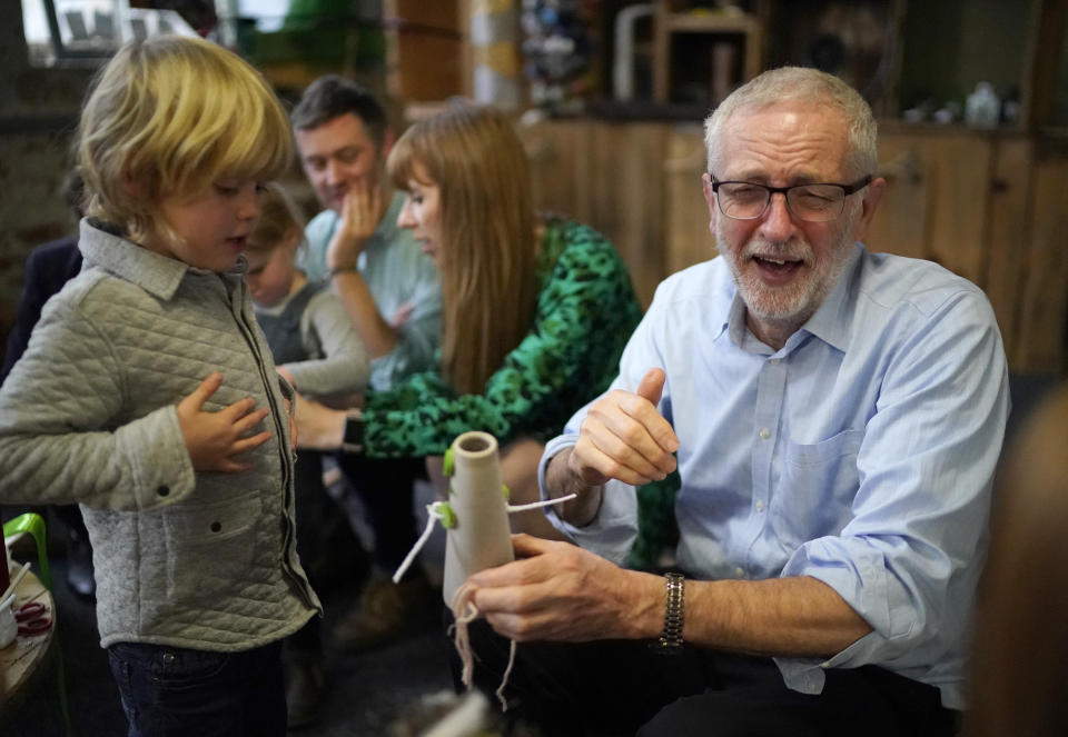 Jeremy Corbyn sees the funny side during a visit to the Scrap Creative Reuse Arts Project, Sunny Bank Mills, The Spinning Mill in Leeds.
