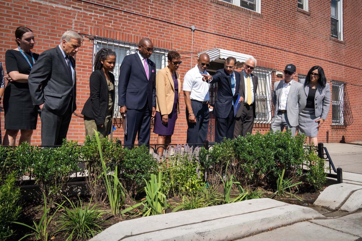 NYC Mayor Eric Adams and the Department of Environmental Protection announce stormwater infrastructure initiatives aimed at making the city more resilient to extreme rainfall in the future, Thursday, Sept. 1, 2022, in South Ozone Park.