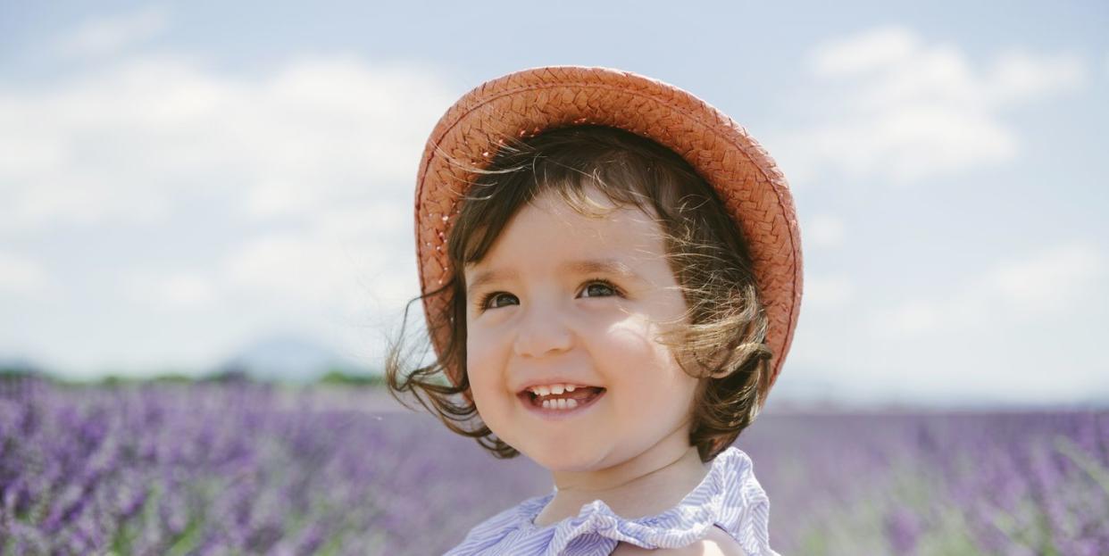 baby girl names starting with e  little girl smiling outdoors