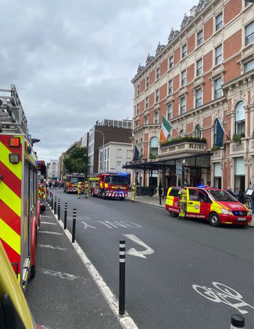 <p>Dublin Fire Brigade/X</p> Firefighters on the scene outside of The Shelbourne in Dublin