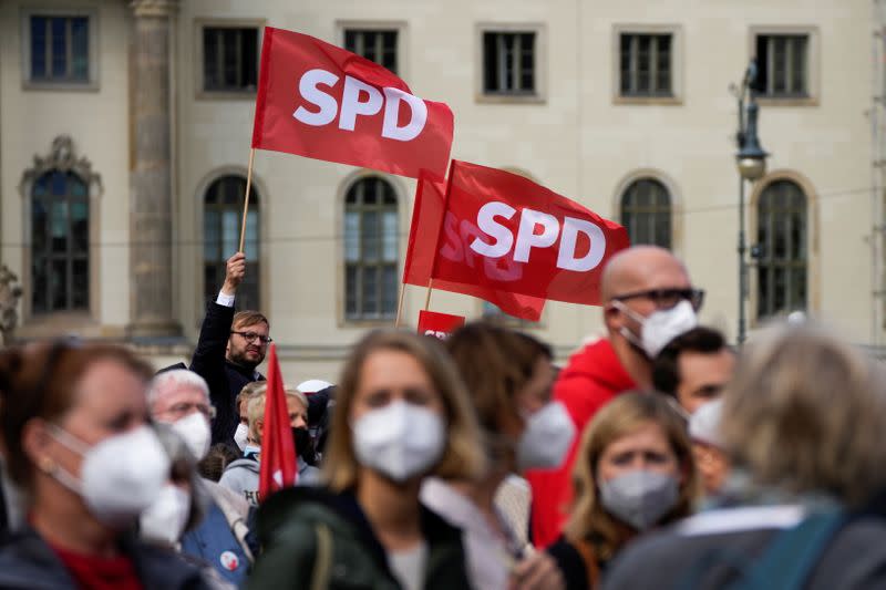 Germany's Social Democratic Party chancellor candidate Olaf Scholz campaigns in Berlin