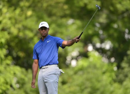 Aug 11, 2018; Saint Louis, MO, USA; Tiger Woods reacts after missing a putt on the 15th green during the third round of the PGA Championship golf tournament at Bellerive Country Club. Mandatory Credit: Jeff Curry-USA TODAY Sports