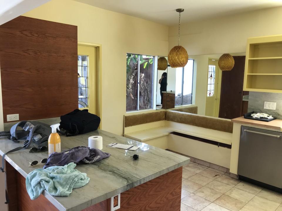 Before image of outdated yellow kitchen