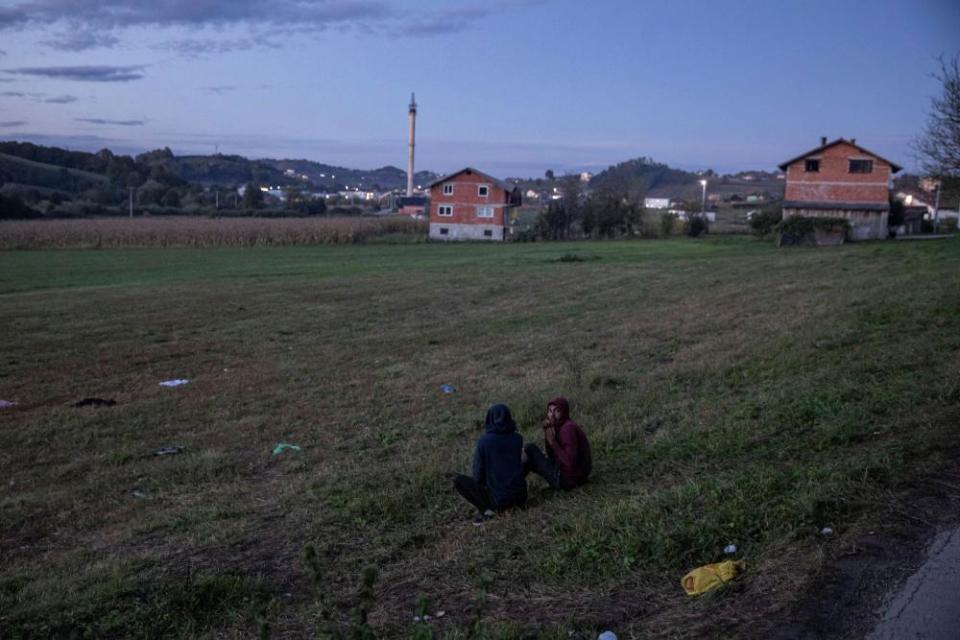 Migrants gather before trying to cross the Bosnia-Croatia border near Velika Kladusa