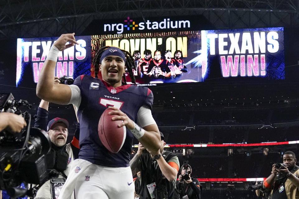 Houston Texans quarterback C.J. Stroud celebrates after their win against the Cleveland Browns in an NFL wild-card playoff football game Saturday, Jan. 13, 2024, in Houston. (AP Photo/Eric Christian Smith)
