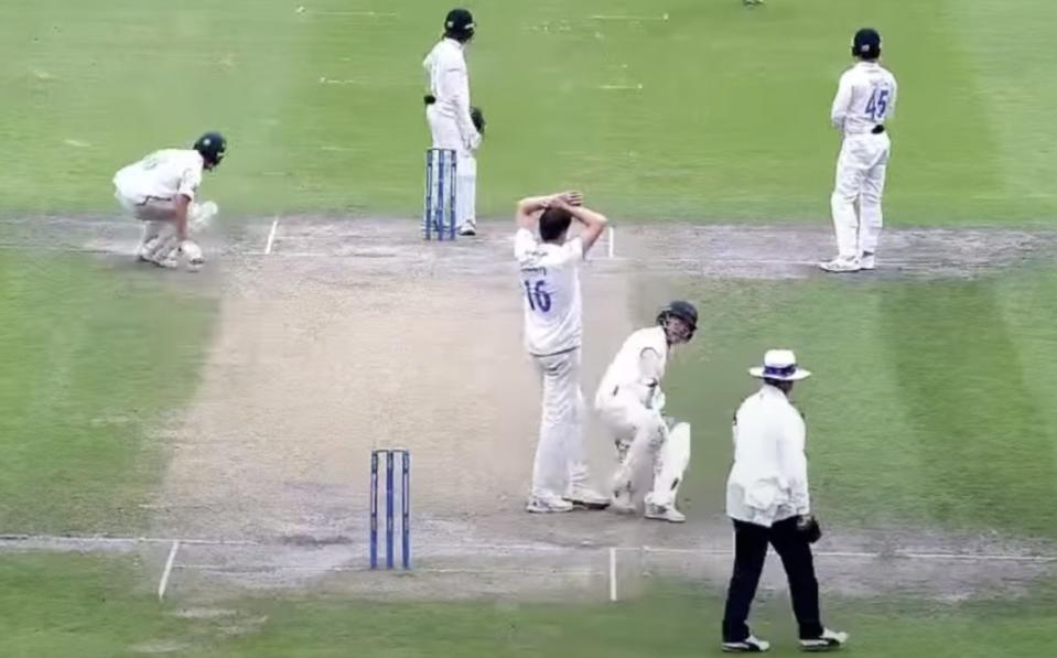 Jack Carson sticks his foot out and nearly trips Leicestershire batsman Ben Cox