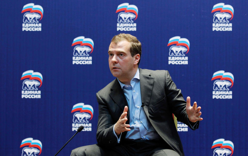 Russian Prime Minister Dmitry Medvedev speaks during his meeting with United Russia members in Vladivostok on Monday, July 2, 2012, with the party emblem in the background. Medvedev arrived in Vladivostok on a four-day visit to the Russian Far East along with 10 ministers, which is expected to include a trip to one of the Russian-held islands off Hokkaido claimed by Japan.(AP Photo/RIA Novosti, Dmitry Astakhov, Government Press Service)