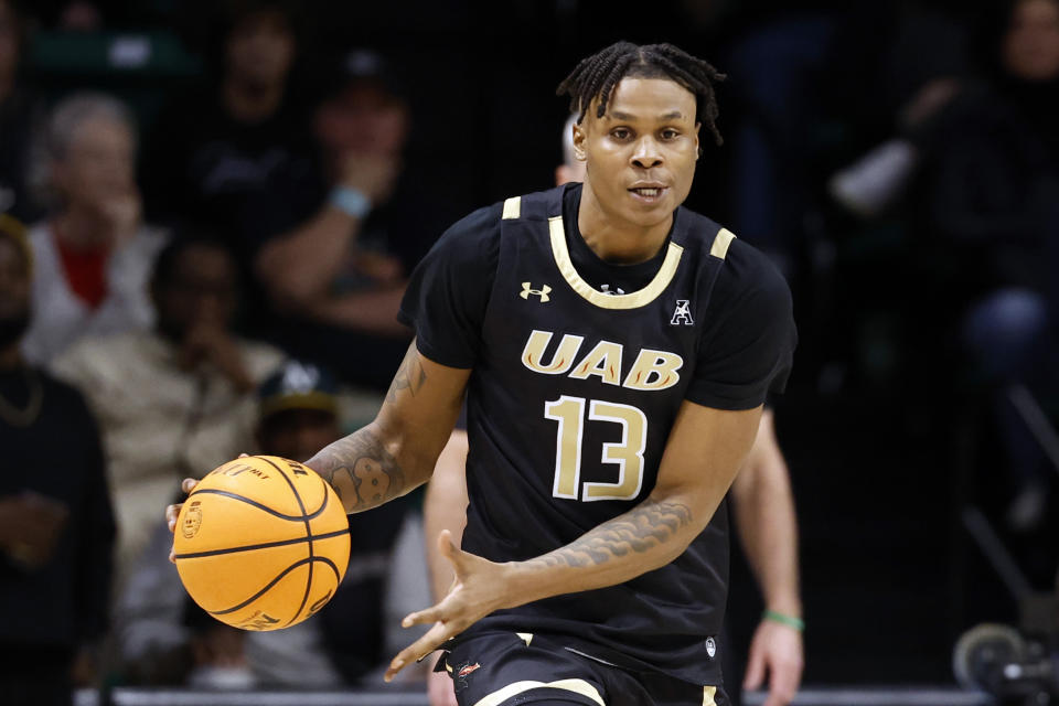 UAB forward Christian Coleman brings the ball up during the second half of the team's NCAA college basketball game against Florida Atlantic, Thursday, Feb. 8, 2024, in Birmingham, Ala. (AP Photo/ Butch Dill)