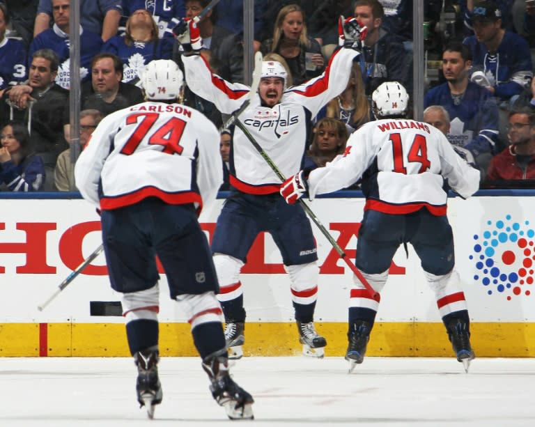 Marcus Johansson (C) of the Washington Capitals celebrates after scoring the overtime and series-winning goal against the Toronto Maple Leafs in Game Six of the Eastern Conference quarter-finals, in Toronto, on April 23, 2017