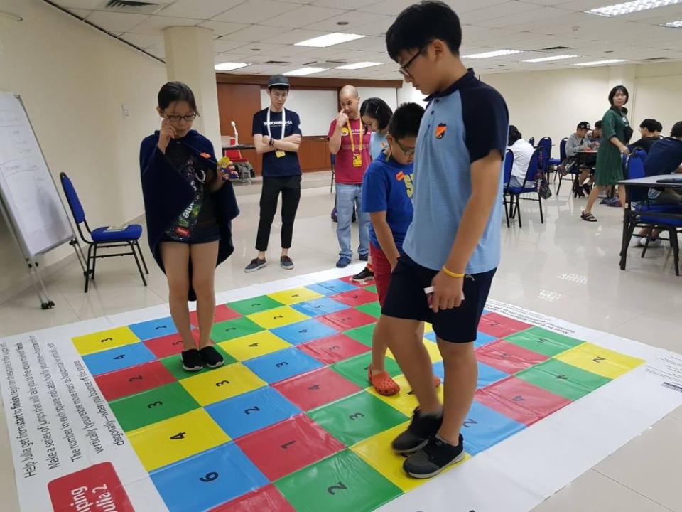 Youths are guided by Mensa members as they take part in problem-solving activities during the Inaugral Mensa International Youth Festival. — Picture courtesy of Malaysian Mensa Society