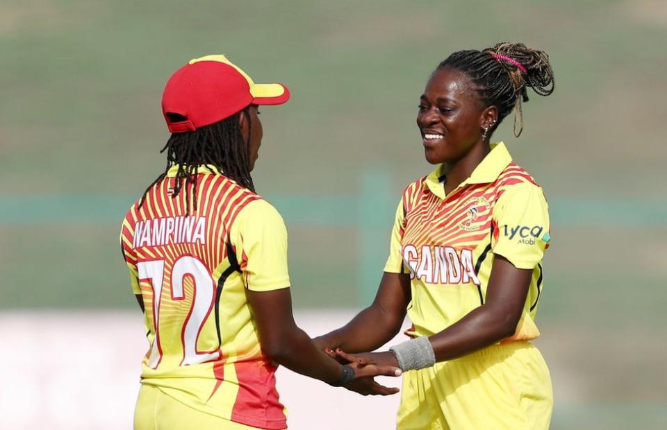 Ritah Musamali of Uganda celebrate with teammate Stephanie Nampiina after taking the wicket of Hasini Perera of Sri Lanka (not pictured).