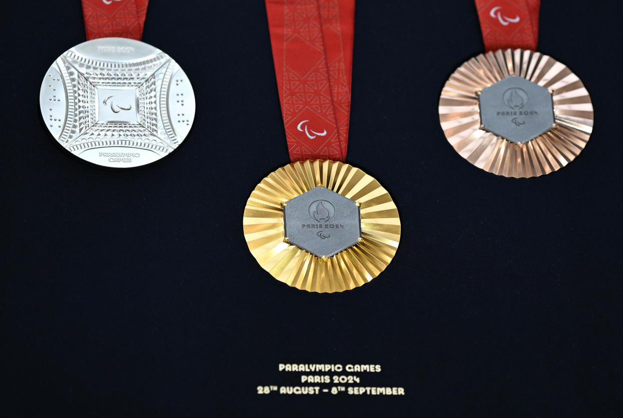 Medals of the upcoming Paris 2024 Olympic and Paralympic Games were unveiled during a media presentation in Saint-Denis, near Paris, France, Feb. 8, 2024. Each of the medals features a small hexagonal piece of iron from the Eiffel Tower. / Credit: Mustafa Yalcin/Anadolu/Getty