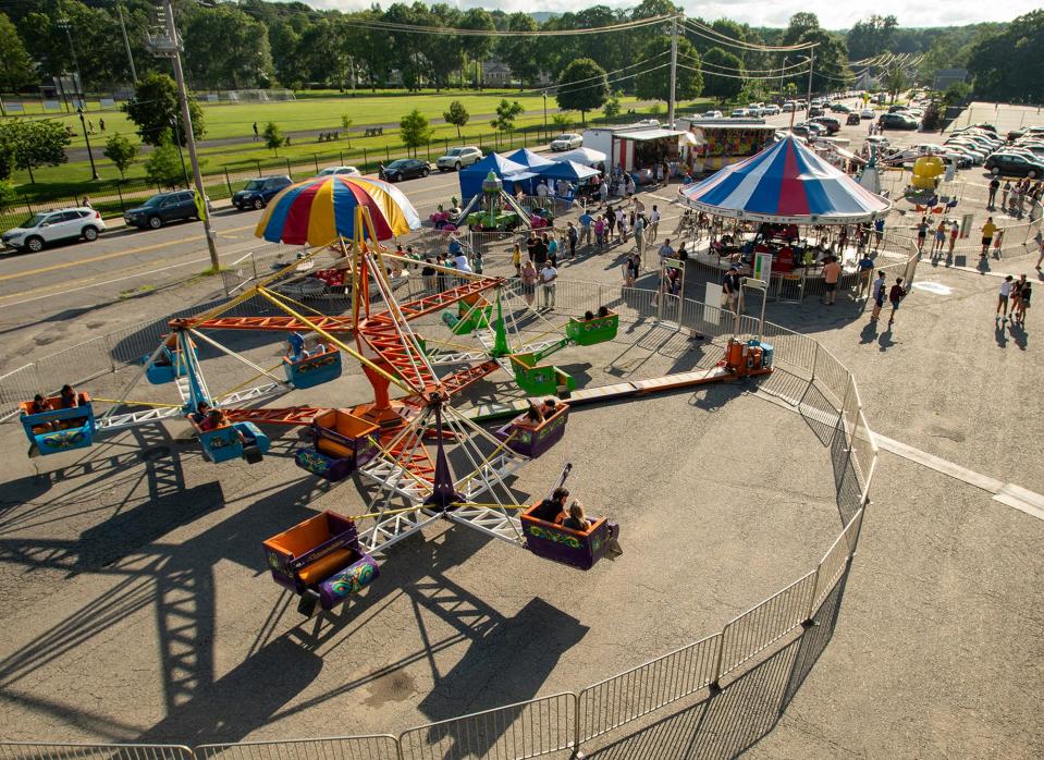 Whalom Weekend combines a traditional carnival with displays of items from the former Whalom Park amusement park Friday. Whalom Weekend runs through Sunday at Doyle Field.