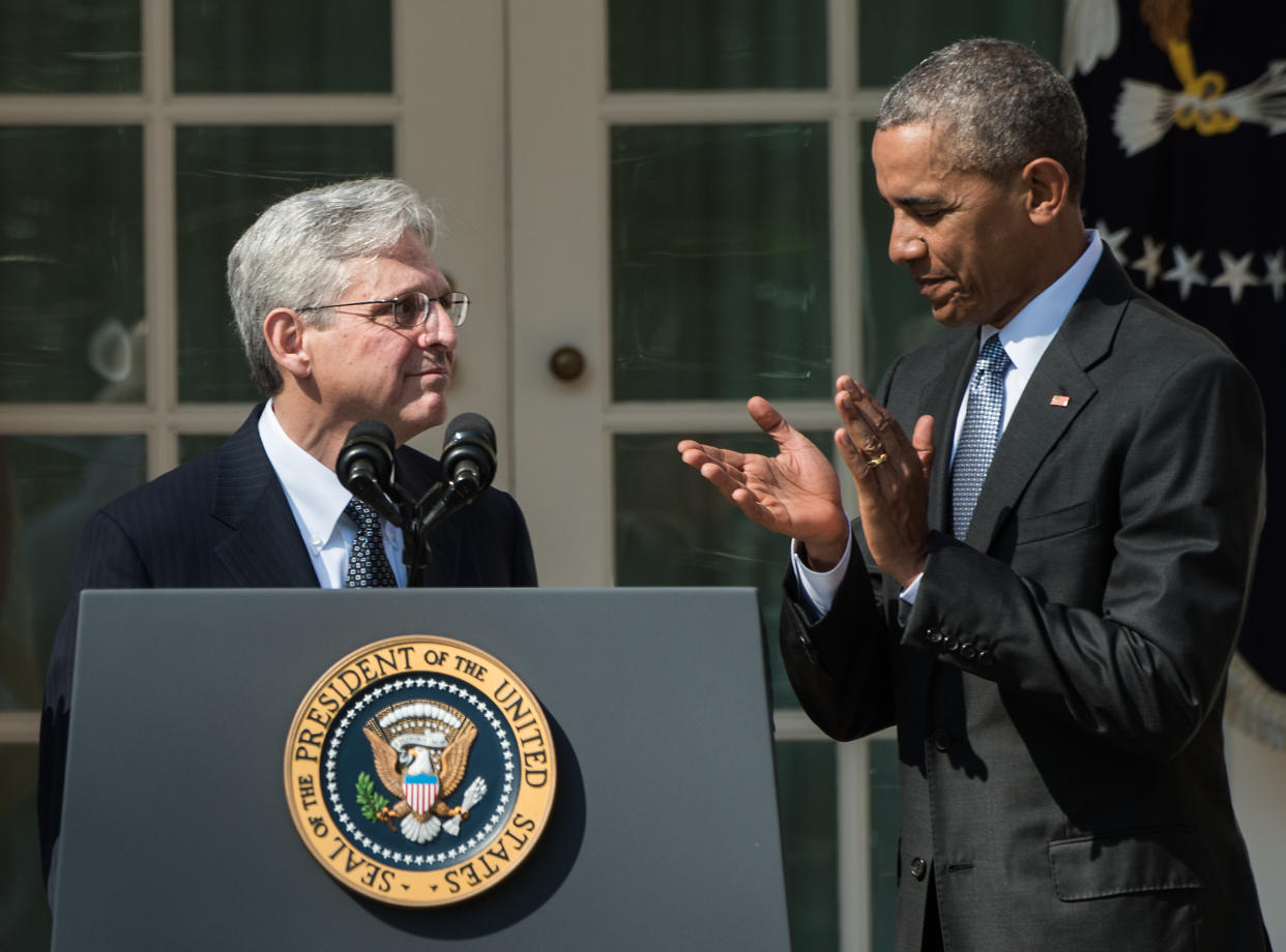 President Barack Obama applauds his Supreme Court justice nominee Merrick Garland in the Rose Garden at the White House in Washington, DC, on March 16, 2016. (Photo: Nicholas Kamm/AFP via Getty Images)