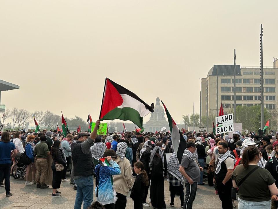 People gather on the legislative grounds for a pro-Palestinian protest in Edmonton. The previously scheduled protest on May 11, 2024, happened hours after police cleared an encampment at the University of Alberta that was in support of Gaza.
