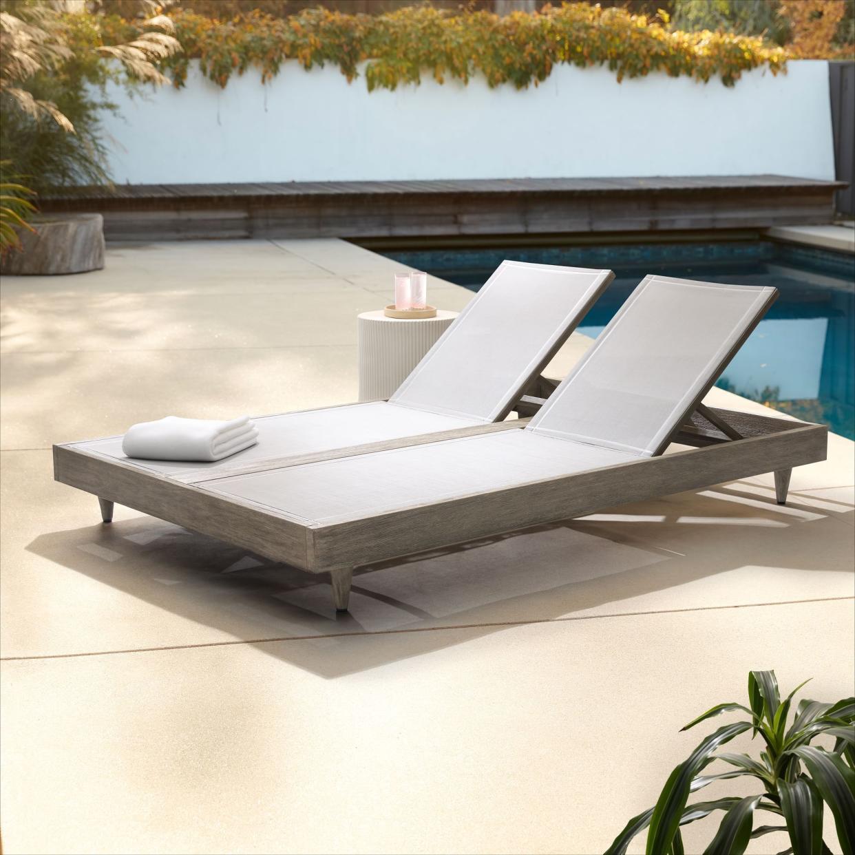 <p><a href="https://go.redirectingat.com?id=74968X1596630&url=https%3A%2F%2Fwww.westelm.com%2Fproducts%2Fportside-textilene-chaise-double-lounger-h3034&sref=https%3A%2F%2Fwww.womansday.com%2Fhome%2Fdecorating%2Fg43368721%2Fbest-pool-lounge-chairs%2F" rel="nofollow noopener" target="_blank" data-ylk="slk:Shop Now;elm:context_link;itc:0;sec:content-canvas" class="link rapid-noclick-resp">Shop Now</a></p><p>Portside Double Chaise Lounger</p><p>westelm.com</p><p>$1079.20</p><span class="copyright">West Elm</span>