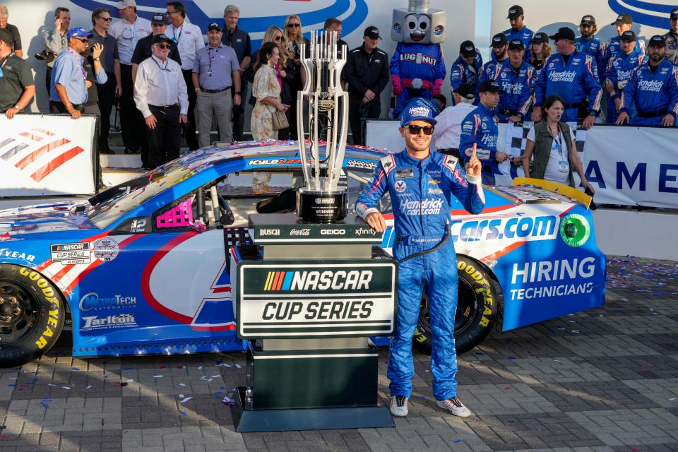 Kyle Larson celebrates one of his season-high nine victories in 2021 -- here at Charlotte Motor Speedway on Oct. 10.