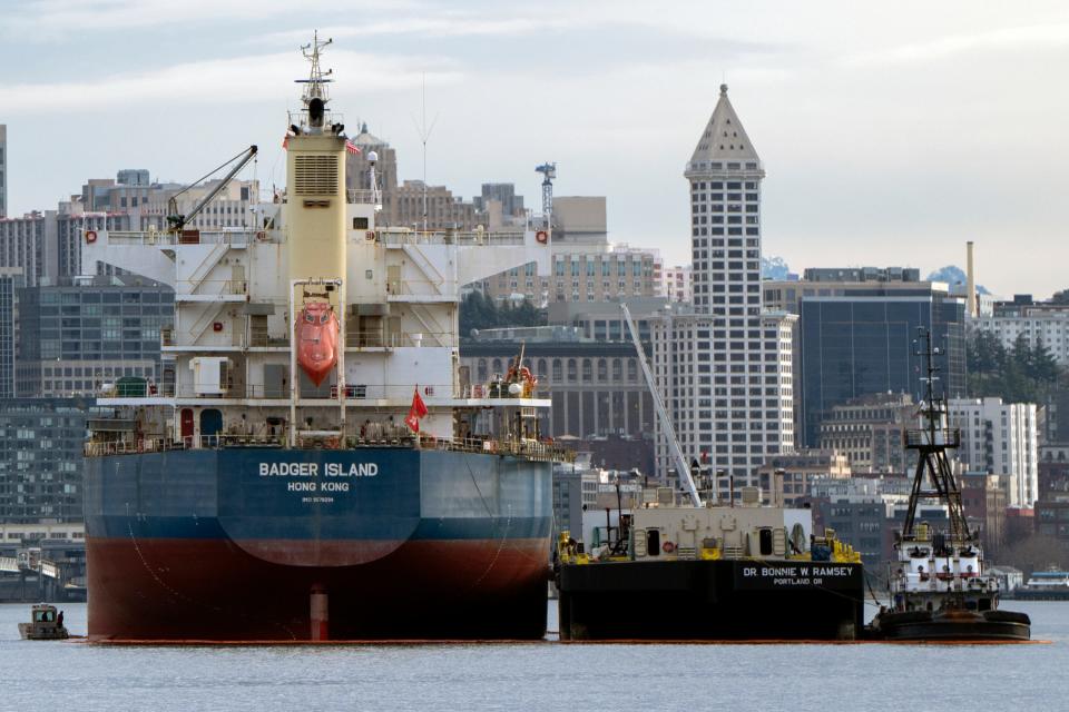 A bulk carrier and other boats are seen in Seattle's Elliott Bay on Saturday, Feb. 17, 2024, near Seattle.