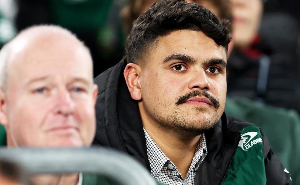 Latrell Mitchell watches on during a Rabbitohs game.