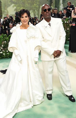 <p>Jamie McCarthy/Getty</p> Kris Kenner and Corey Gamble at the 2024 Met Gala.