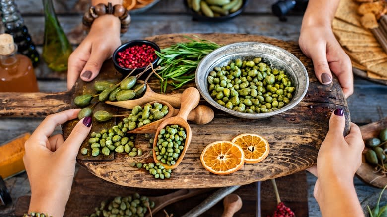 Capers on a cutting board