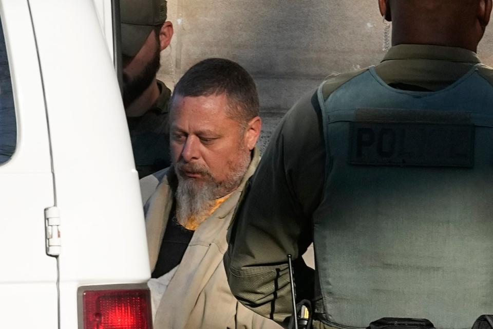 Richard Allen is led out of the Carroll County courthouse following a hearing on 22 November (Copyright 2022 The Associated Press. All rights reserved)