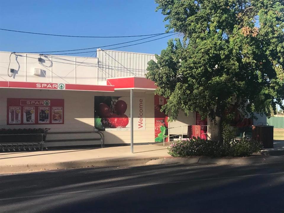 Pictured is the supermarket from the outside before the fire. Source: Supplied