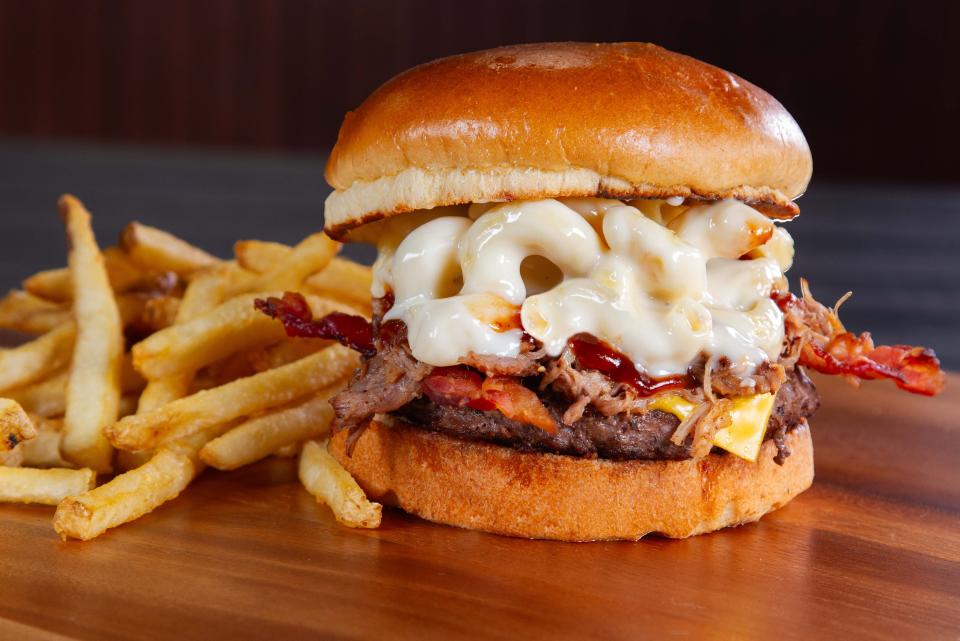 The barbecued pulled pork and mac and cheese burger is one of the new menu items that will be rolled out in March at Beef O'Brady's in Wooster.