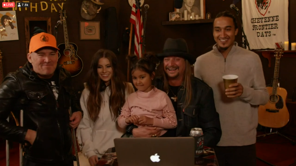 Kid Rock (center) holds his granddaughter, Skye, during his 50th birthday hangout, streamed Jan. 17, 2021, from Whites Creek, Tenn. Also pictured, from left, are Billy Ritchie, Marisa Trovato and Bobby Ritchie Jr.